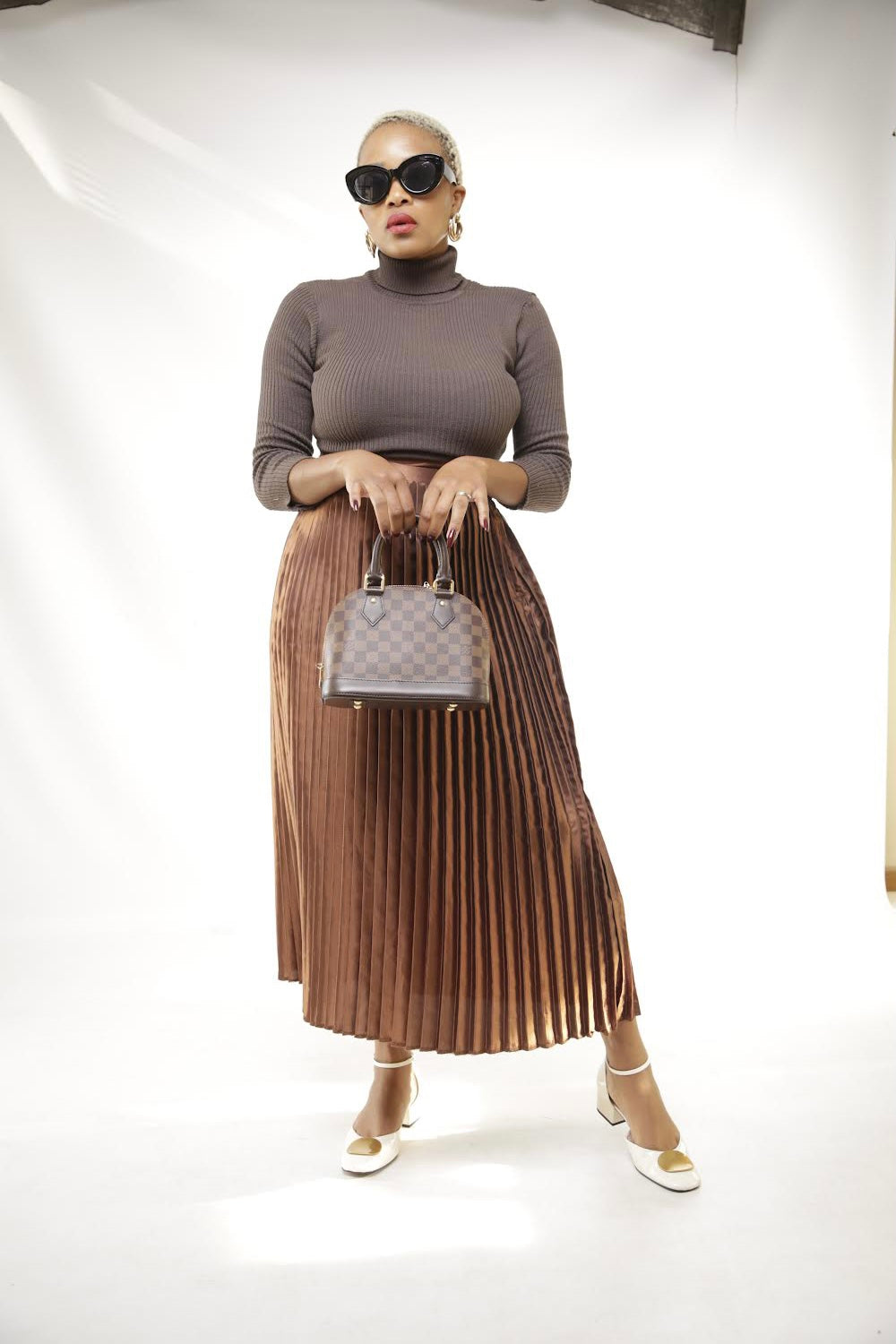 W23 : CHOC PLEATED SKIRT